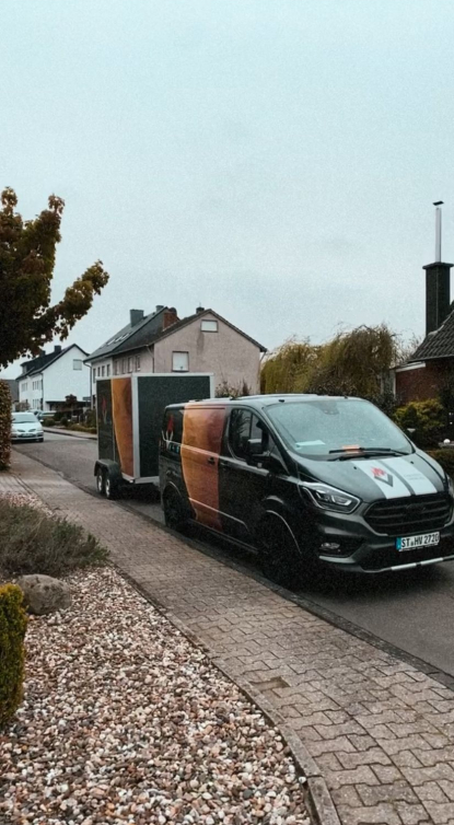 Vosskuhl-Auto-mit-haenger.jpeg